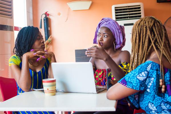 Photo of African women working happily in the workplace