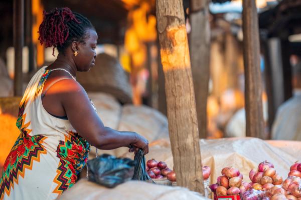 Ghanian woman working at her market stall