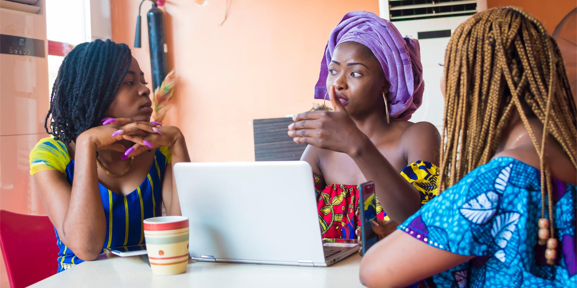 Photo of African women working happily in the workplace